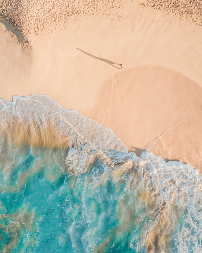 Travel Insurance - Beach of turquoise sea in a sunny day